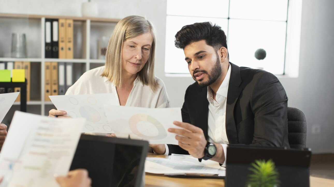 Diverse business people discussing common project on meeting