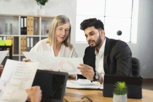 Diverse business people discussing common project on meeting